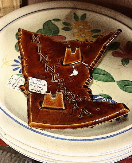 One of our more unique finds, a souvenir Minnesota-shaped ashtray.