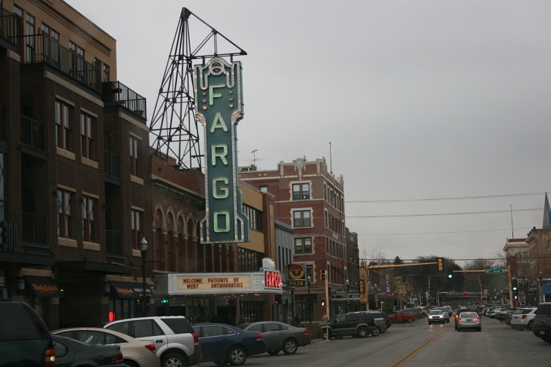 A view of the 300 block on North Broadway, including signage for the Fargo Theatre, built in 1926 as a cinema and vaudeville theatre. The theatre is on the National Register of Historic Places and serves as a venue for independent and foreign films, concerts, plays and more.