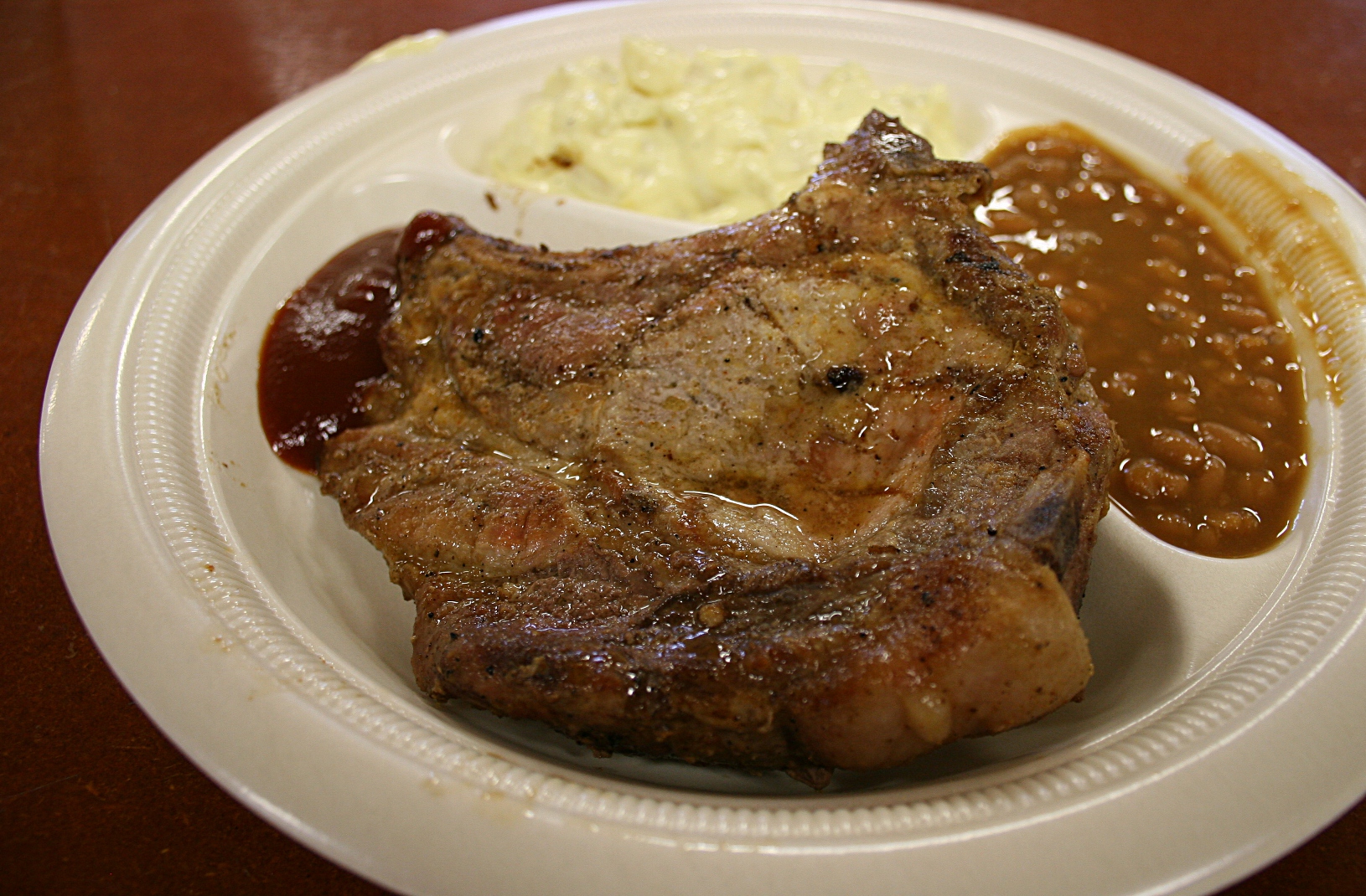 The grilled pork chop meal.
