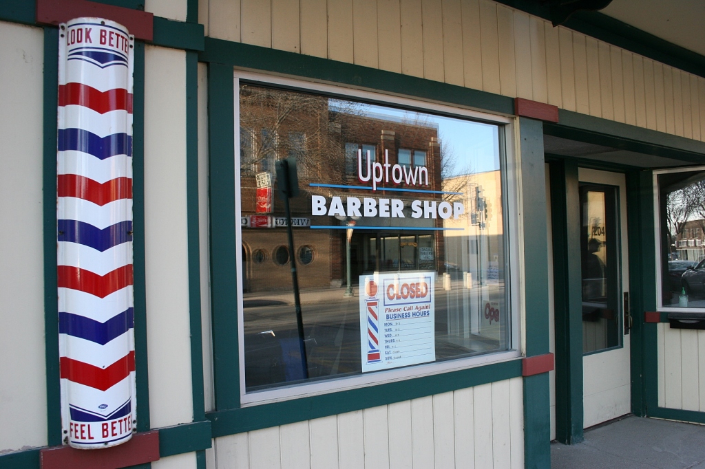 A downtown barbershop complete with a barber's pole charms visitors like me.