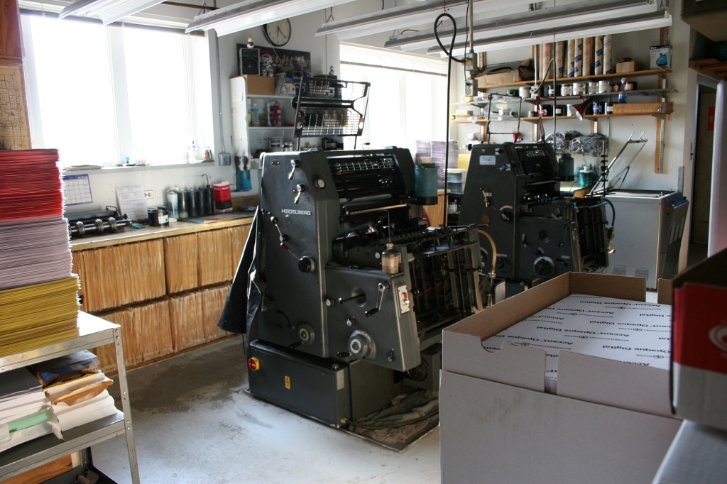 The 1960s Heidelberg offset presses, still used in the second floor print shop.
