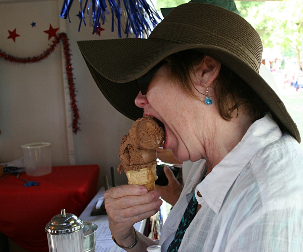 Enjoying an ice cream cone.