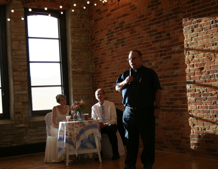 Just look at how the natural light plays on the brick walls as the Rev. Robert Snyder, retired pastor of Trinity Lutheran Church, leads the group in prayer.
