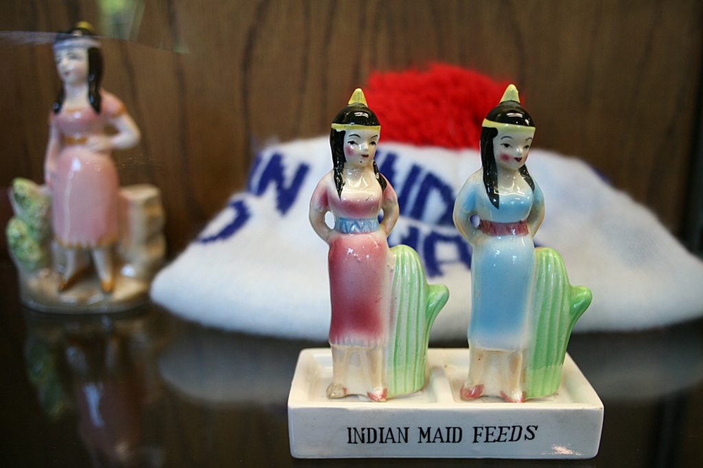 Indian Maid Feeds memorabilia is displayed in glass cases along with an impressive collection of butter molds and other items.