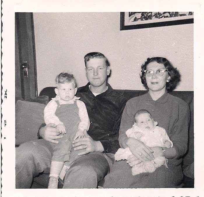 My parents holding my older brother, Doug, and me in this January 1957 photo.