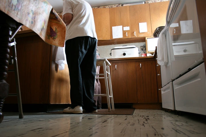 Inside the church kitchen, that's Elsie standing next to her stool.