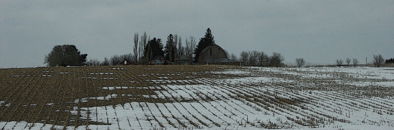 Rural Minnesota, farm behind hill