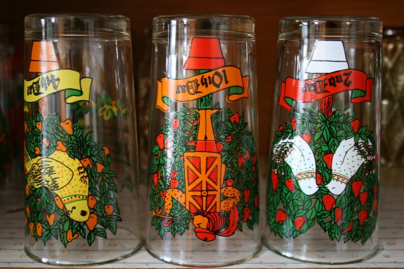 Come December, I swap out my regular vintage drinking glasses for the Twelve Days of Christmas glasses. These were gifted to me by the furniture store right across the street from the newspaper office where I worked in 1978 in Gaylord. Since then, I've acquired the same set of holiday glasses for each of my four children at garage sales and an antique shop.