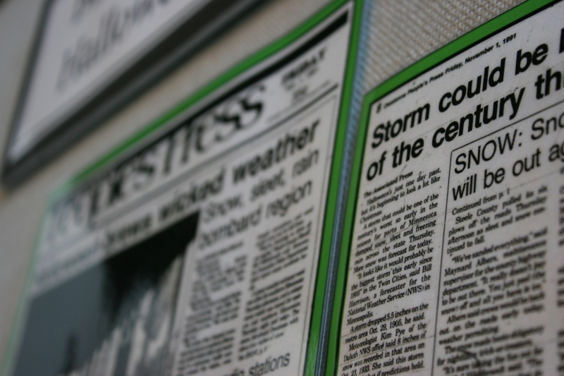 These newspaper articles feature snowstorms in the county.