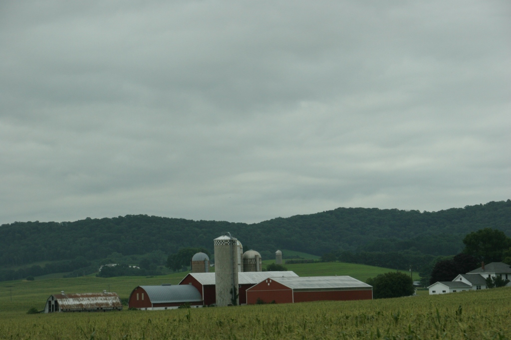 Rolling hills and farms define the land east of La Crosse along Interstate 90 in the southwestern part of Wisconsin..